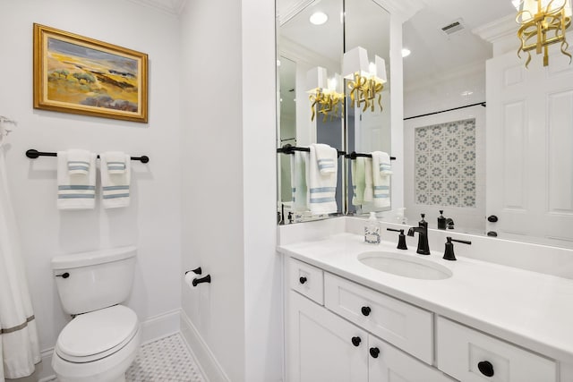 bathroom with crown molding, visible vents, toilet, vanity, and baseboards