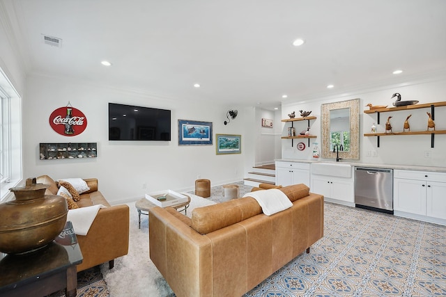 living room featuring visible vents, stairway, ornamental molding, wet bar, and recessed lighting