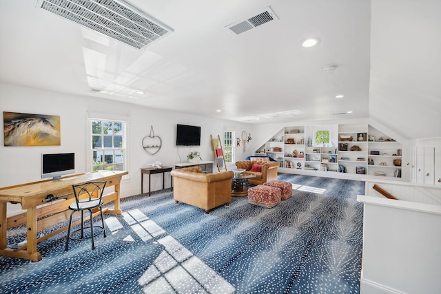 living area featuring built in shelves, visible vents, vaulted ceiling, and recessed lighting