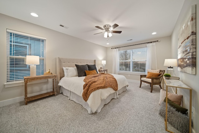 carpeted bedroom with baseboards, visible vents, ceiling fan, and recessed lighting