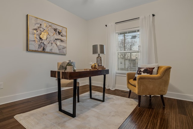 home office featuring wood finished floors and baseboards