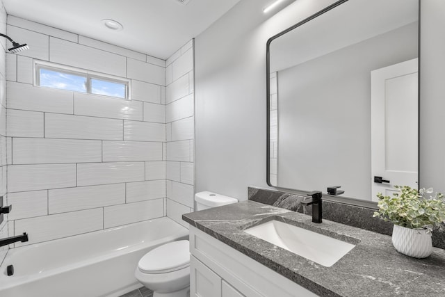 full bath with toilet, vanity, and shower / bathtub combination