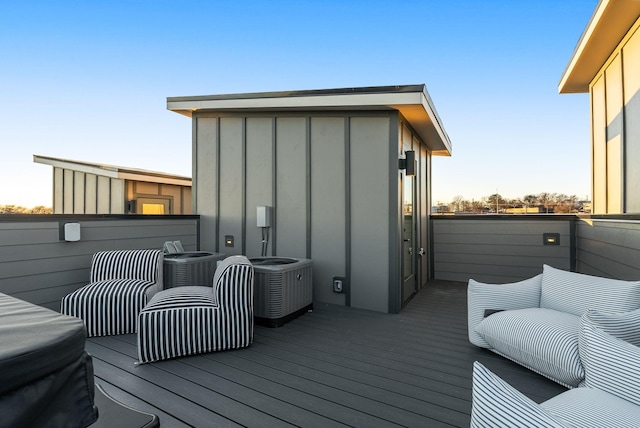 wooden deck with central AC unit