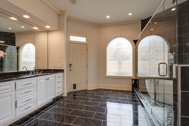 bathroom with marble finish floor, ornamental molding, a stall shower, vanity, and baseboards