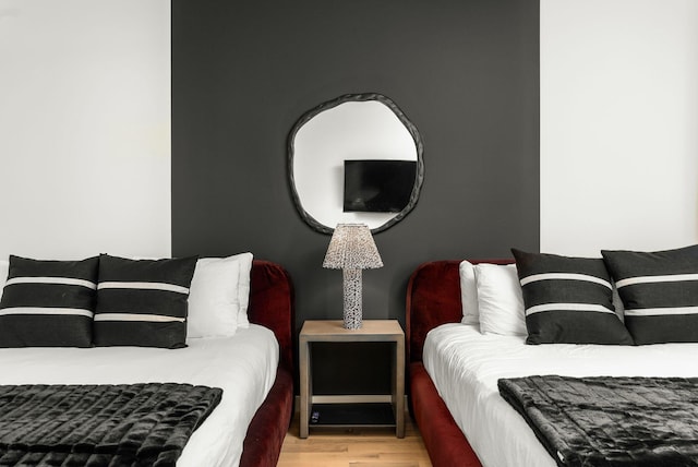 bedroom with light wood-type flooring