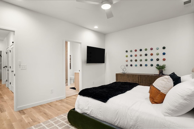 bedroom featuring recessed lighting, visible vents, light wood-style flooring, connected bathroom, and baseboards