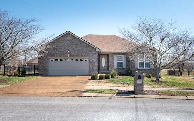 view of front facade featuring brick siding, a shingled roof, concrete driveway, an attached garage, and fence