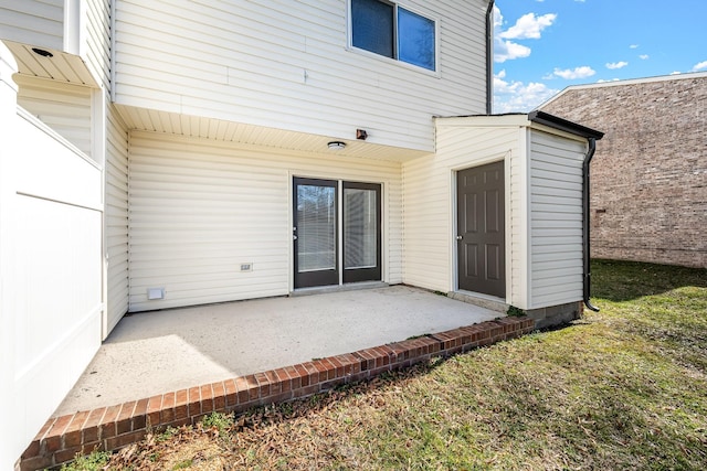 back of house with a patio