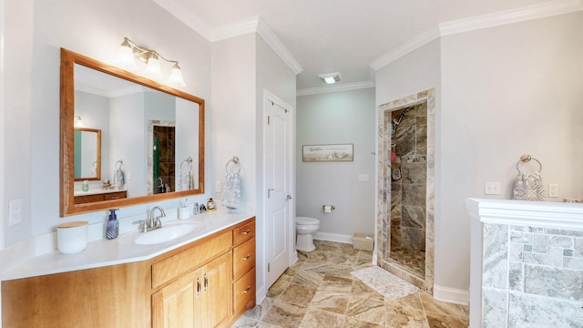 full bathroom with crown molding, toilet, vanity, tiled shower, and baseboards