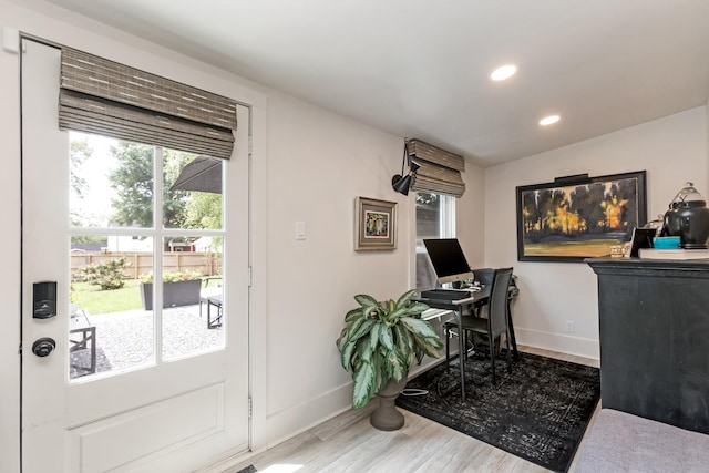 office area with recessed lighting, baseboards, and wood finished floors