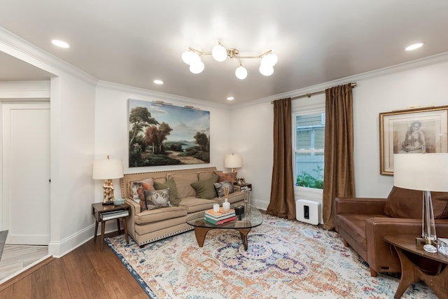 living area with ornamental molding, recessed lighting, baseboards, and wood finished floors