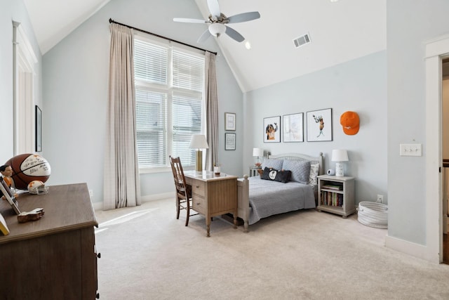 bedroom with high vaulted ceiling, light colored carpet, a ceiling fan, baseboards, and visible vents