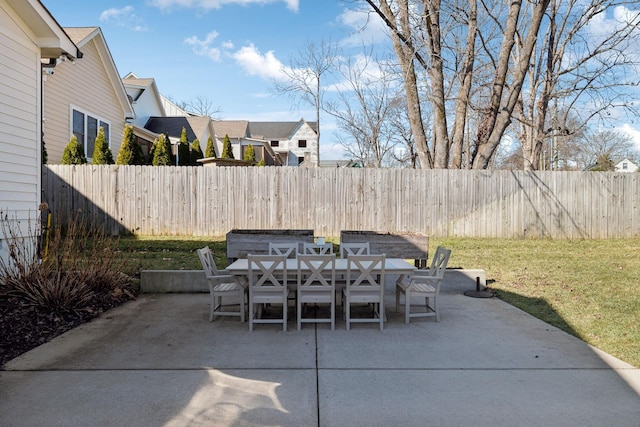 view of patio / terrace featuring fence and outdoor dining space