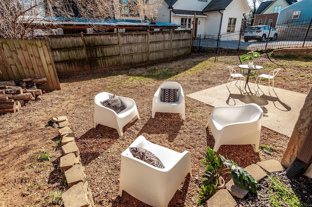 view of yard featuring a patio area and fence