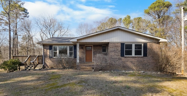 view of front of house with brick siding