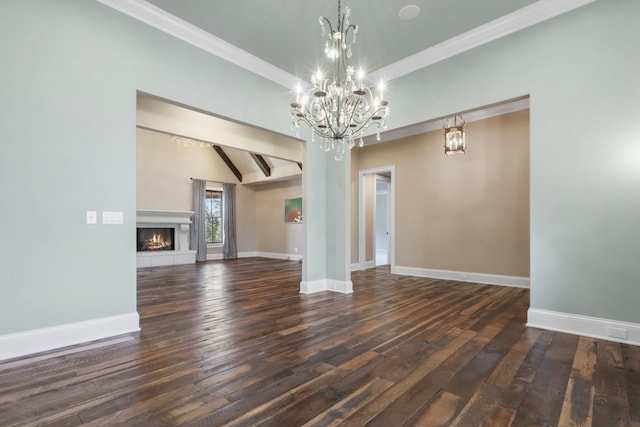 unfurnished living room with baseboards, a warm lit fireplace, a chandelier, and hardwood / wood-style flooring