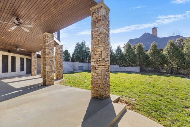 view of patio / terrace featuring a ceiling fan and fence