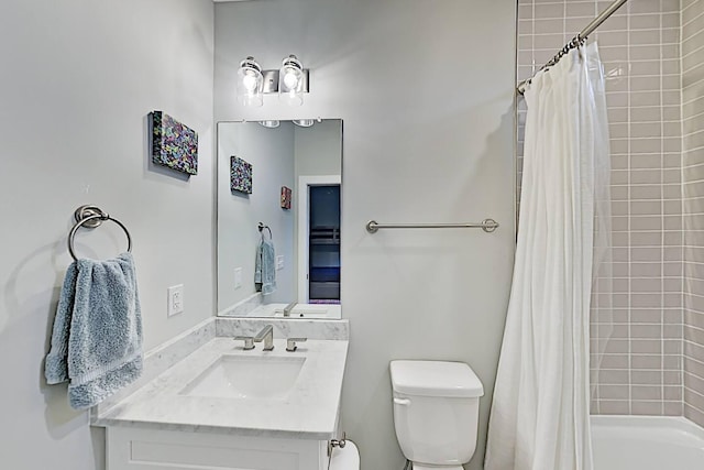 bathroom with shower / bath combo with shower curtain, vanity, and toilet