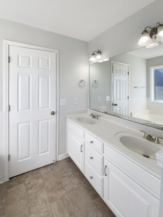 1173 Snoopy Dr, Clarksville, TN 37040 - full bathroom featuring tile patterned floors, a sink, and double vanity