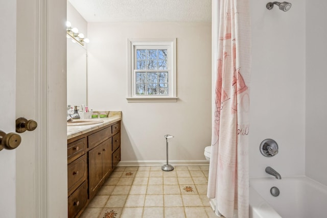 bathroom with baseboards, toilet, shower / bath combo with shower curtain, a textured ceiling, and vanity