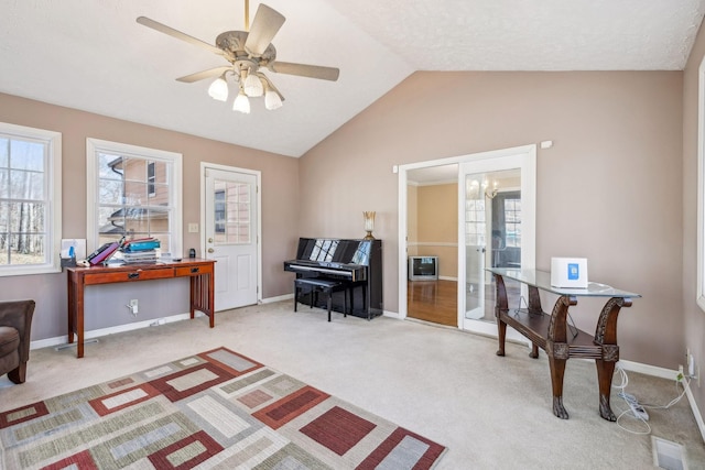 sitting room with lofted ceiling, visible vents, plenty of natural light, and carpet flooring