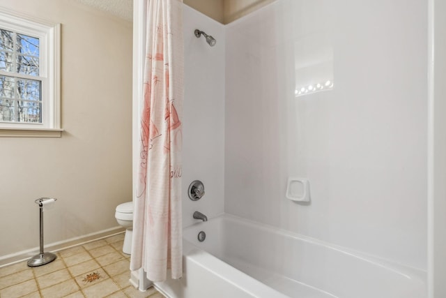 bathroom with shower / tub combo, baseboards, toilet, and tile patterned floors