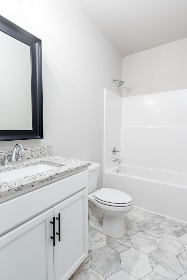 full bathroom with toilet, shower / bathtub combination, marble finish floor, and vanity