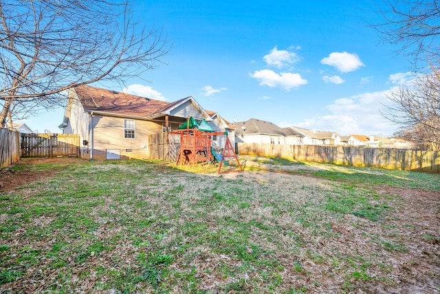 view of yard with a fenced backyard