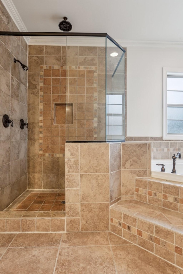 bathroom with a garden tub, a stall shower, and crown molding