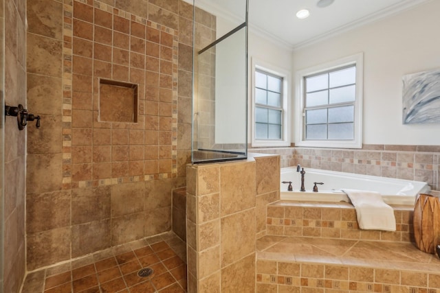 bathroom featuring tiled shower, ornamental molding, and a bath