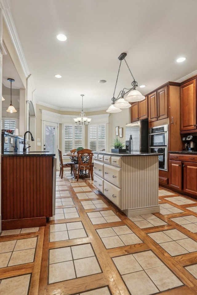 kitchen with decorative backsplash, dark countertops, crown molding, and stainless steel appliances