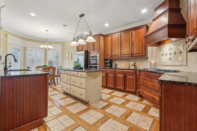 kitchen with stainless steel appliances, a sink, custom range hood, crown molding, and backsplash