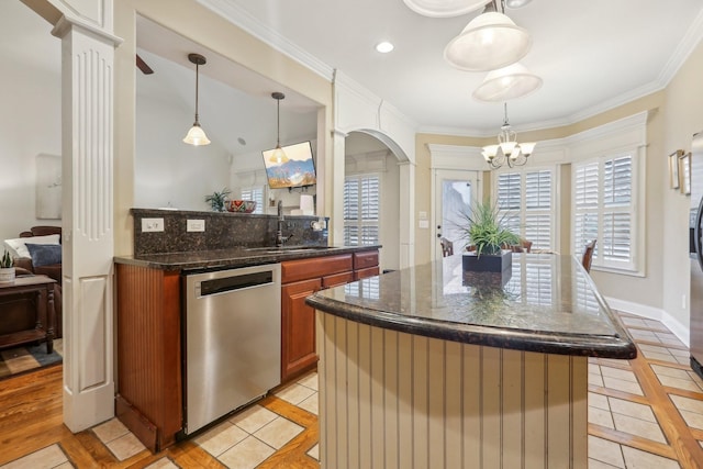 kitchen with a sink, stainless steel dishwasher, arched walkways, brown cabinetry, and light tile patterned floors