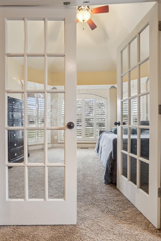 interior space featuring french doors and carpet floors