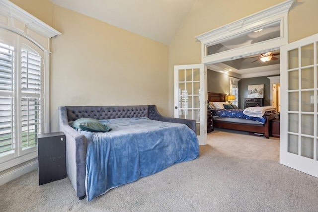 bedroom featuring french doors, carpet flooring, and vaulted ceiling