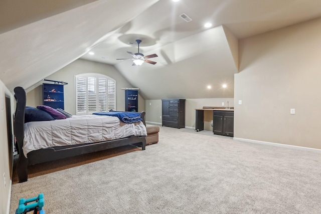 bedroom with visible vents, light carpet, baseboards, ceiling fan, and vaulted ceiling