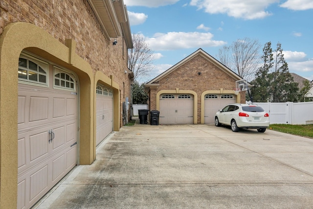 garage with fence