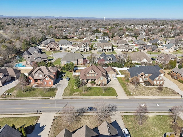 birds eye view of property with a residential view