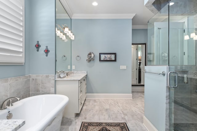 full bathroom with a freestanding tub, vanity, baseboards, a shower stall, and crown molding