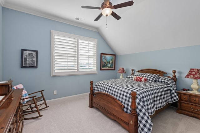 bedroom with lofted ceiling, light colored carpet, a ceiling fan, baseboards, and visible vents