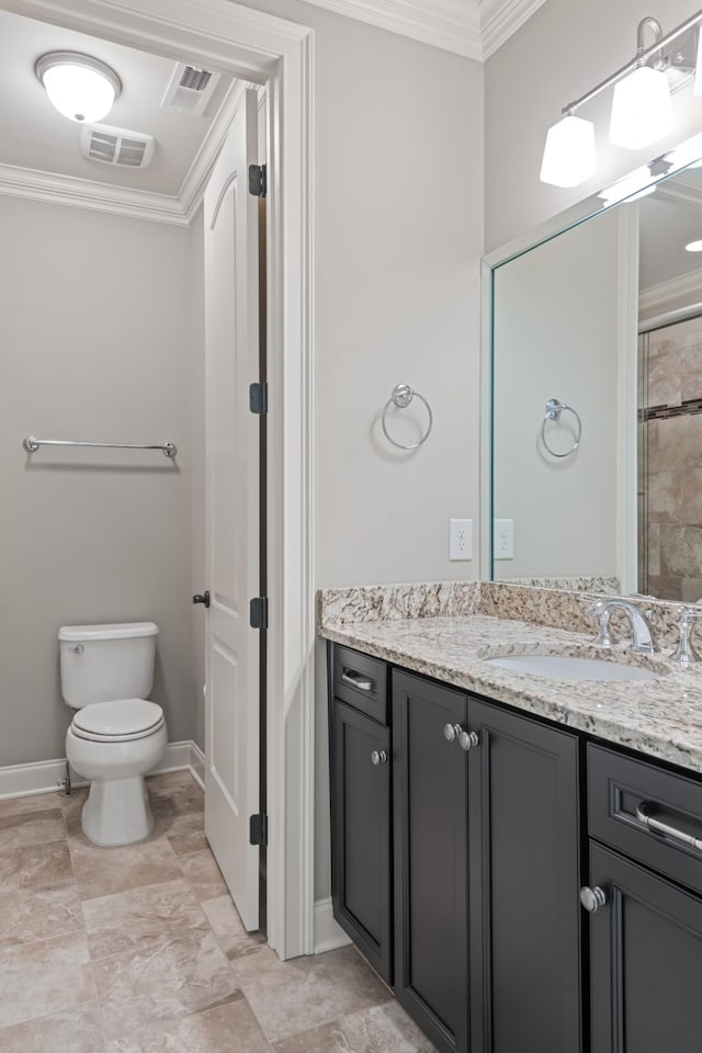 bathroom featuring toilet, visible vents, and ornamental molding