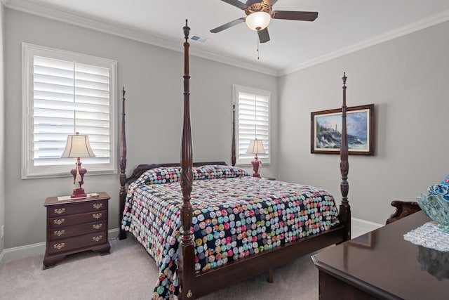 bedroom featuring baseboards, carpet flooring, visible vents, and crown molding