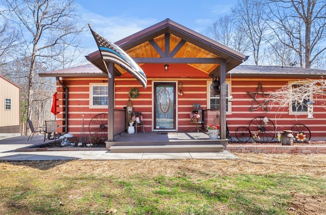 view of front of house featuring metal roof