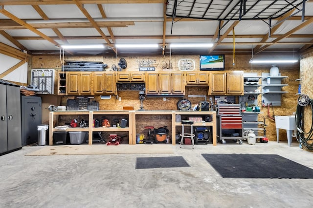 garage with a workshop area