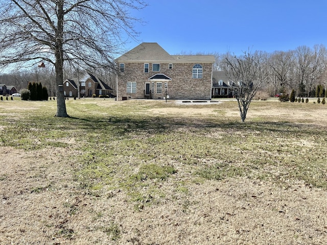 view of front of house with a front lawn