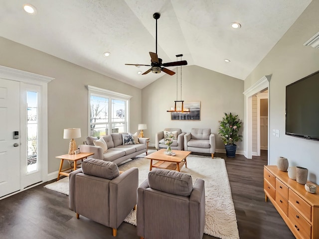 living room with lofted ceiling, recessed lighting, a ceiling fan, baseboards, and dark wood finished floors