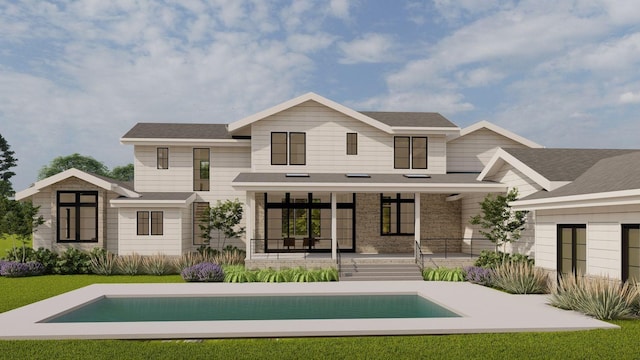 rear view of property with covered porch and an outdoor pool