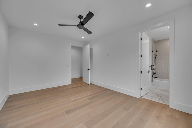 unfurnished bedroom with recessed lighting, wood finished floors, ceiling fan, and connected bathroom