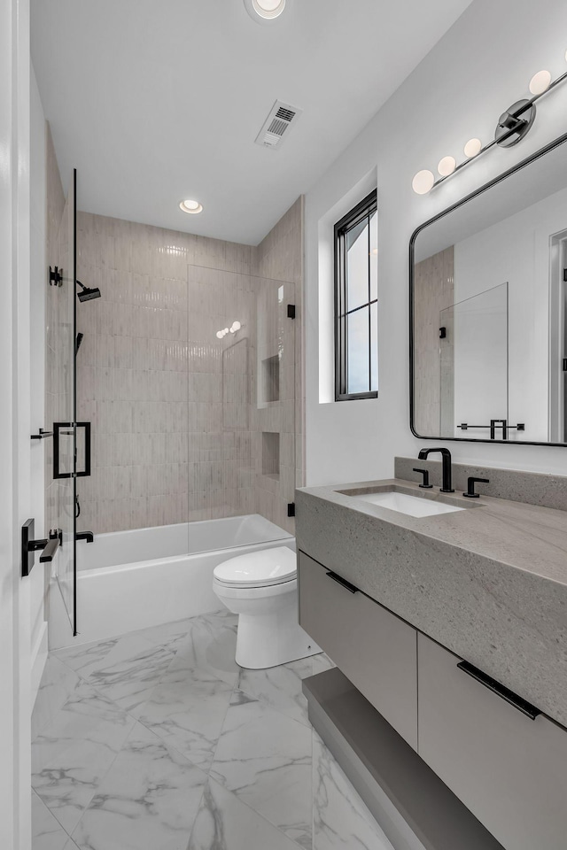 full bathroom featuring recessed lighting, vanity, toilet, visible vents, and tub / shower combination