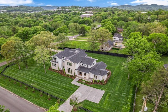 birds eye view of property featuring a mountain view